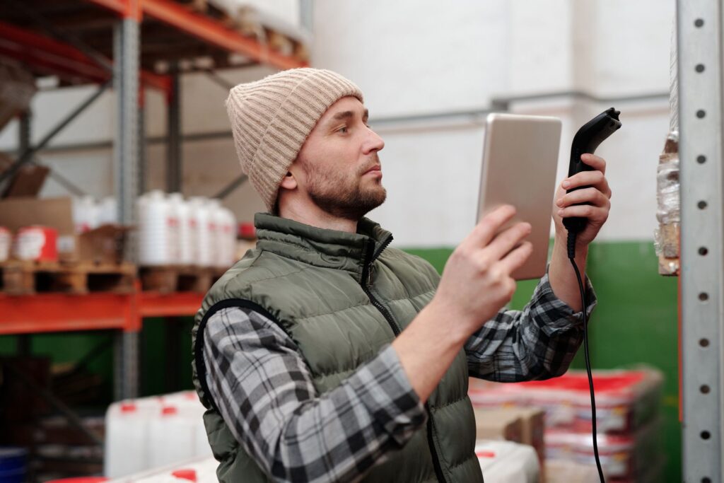 Staff doing a stock take with a barcode scanner